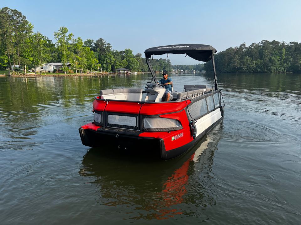 Front view of the red Sea-Doo Switch tritoon out on Jackson Lake